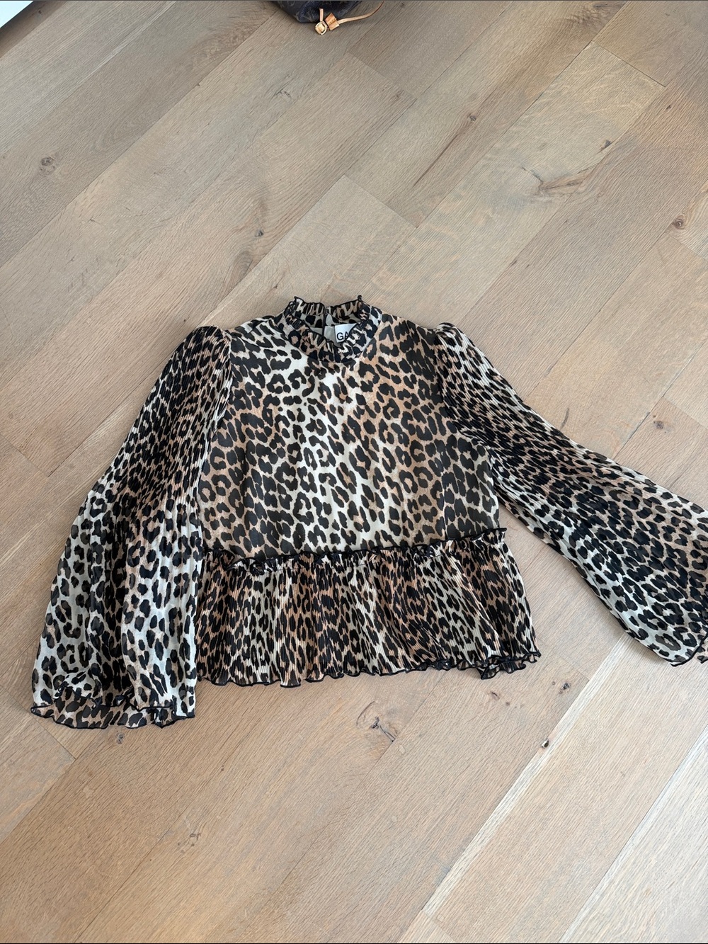 Designer Ganni Leopard top